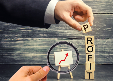 Increase profits and investment fund. Concept of business success, financial growth and wealth. salary increase. Hand of a businessman, leader or bossの写真素材