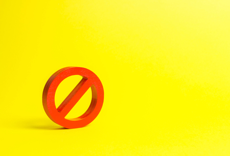 No sign or No symbol on an yellow background. Minimalism. The concept of prohibition and restriction. Censorship, control over the Internet and information. Restrictive laws. Crazy laws printer.の写真素材