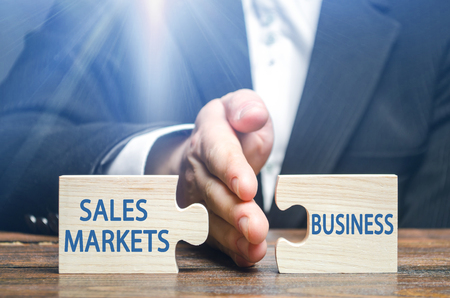 A businessman or an official initiates cuts off the business of foreign markets for products. High tax burden and inability to compete with business opponents. Bureaucracy and corruption, trade wars.の写真素材
