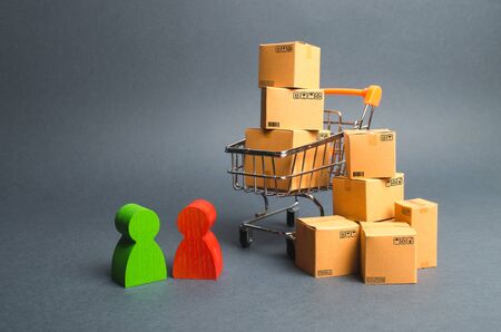 Trading car with boxes, a buyer and the seller, the manufacturer and the retailer. Business and commerce. Discussion of the terms of the transaction, the purchase of goods and services.の写真素材