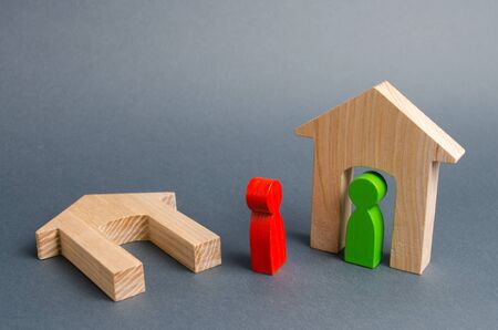 A man who has lost his home is asking for help and shelter from his neighbor. Concept of assistance to those in need in disasters and natural disasters. War, refugees. Mutual assistance, understandingの写真素材