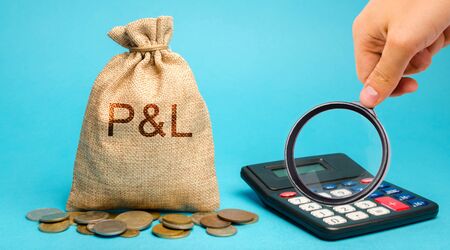 Money bag with the word Profit & loss and calculator. Business analytics and report. Company financial performance. Cash flow generation. Profit, income, expenses, revenue. ROI. ROR. P&Lの写真素材