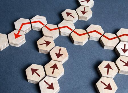The red arrow finds its optimal path through many impassable options. Strategic planning, business development, search for new markets and opportunities. Risk management, making the right decisions.の写真素材