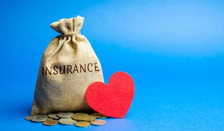 Money bag with coins and the inscription Insurance and a heart. The concept of medical insurance of life, family, health. Healthcare. The accumulation of money. Savingの写真素材
