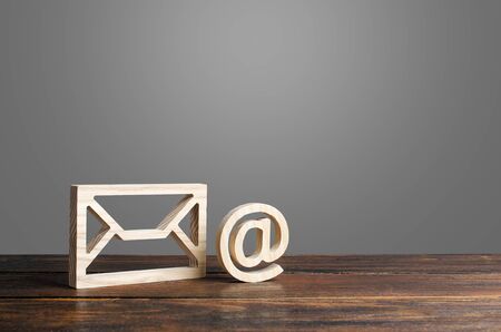 Email symbol at commercial and envelope. internet correspondence. Contacts for business. Internet and global communication technologies, digitalization of economy and processes.の写真素材
