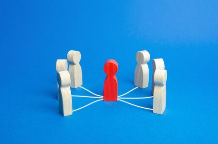 Mediation intermediary between people. Business deal. Political diplomatic negotiations. Conflict resolution and consensus building. Influential person with connections. The leader controls the team.の写真素材