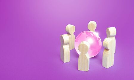 Pink earth globe is surrounded by people. Consolidation in solving problems. Communication cooperation. Diplomacy negotiation process. Collaboration protection of women rights and freedoms worldwideの写真素材