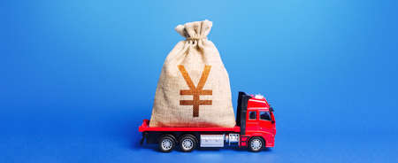 The truck is carrying a huge Yen Yuan money bag. Great investment. Anti-crisis measures of...