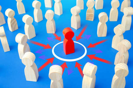 The red man is protected by a barrier from external threats. Information hygiene. Protection of physical and mental health, keep away from dangers. Reduce the impact of the surrounding toxic society.の写真素材