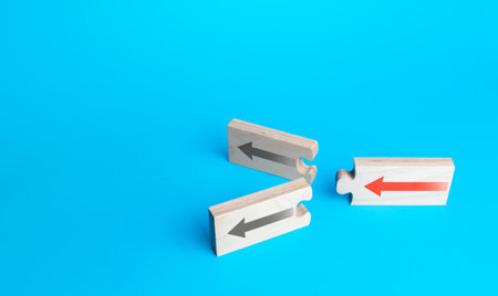 Arrow puzzles with alternative paths on a blue background.の写真素材