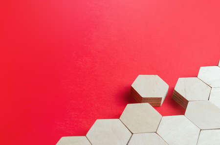 Hexagonal figure emerges from holistic structure. Leave the line, exit the system. Go away. Join or enter. Complete. Uniqueness initiative. Break order. Going beyond. Untypical Concept. Falling apartの写真素材