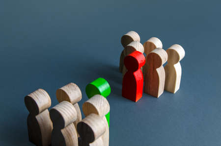Conflict between teams. Resolution of conflict through negotiations. Mediation and Arbitration. Search for compromise. Concluding a truce, end of confrontation. Rivalry, struggle for leadership.の写真素材