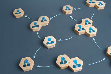 Communication of people in the business of the company. Delegation of work and responsibilities. Functioning of departments and divisions of the company. Decentralized networking. Teamwork cooperationの写真素材