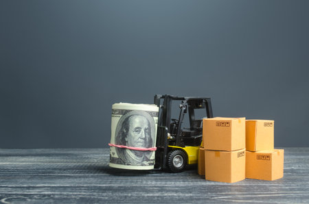 Forklift with money dollar roll and boxes. Profit from selling goods, trade income. Transport business. Economic zone. Import export. Logistics. Taxes, budgetary donor support. Transportation costの写真素材