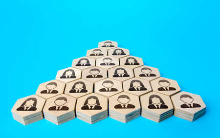 Company employees in a hierarchical pyramid. Classic form of organizational management. Personnel...