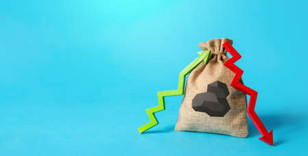 Bag with coal and up down arrows. Energy crisis. Unstable high power-generating coal prices to...