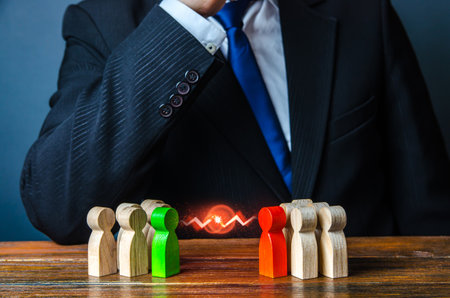 Businessman leader is thinking about resolving conflict of people groups. Rivalry and competition. Resolution, compromise through negotiations. Reconciliation and Consolidation. Mediator, mediation.の写真素材