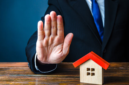 Refusal to provide housing. Bank refuse to give a mortgage loan. Low credit score. Confiscation of pledged property. Building commissioning. Building codes. Cancellation of deal buying real estateの写真素材