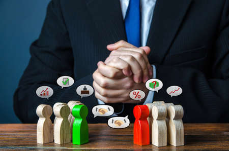 Mediator concluded a successful deal between the parties. Conflict resolution and discussion of cooperation. Business relationship. Mediation and negotiation. Compromise and profitable collaborationの写真素材