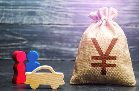 Couple figurines and chinese yuan or japanese yen money bag. Wealth and earnings level. Transport policy. Budget. Social research, consumer preferences. Marketing and targeting. Investments.の写真素材
