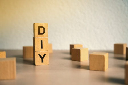 Wooden blocks with the word DIY - Do It Yourself concept. The method of self-creation of things without the help of professionals. selective focusの写真素材