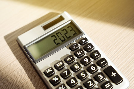 Calculator with numbers 2023. Budget planning concept. financial goals and plans. business and...