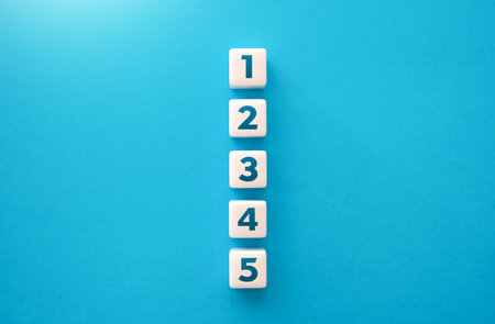 Blocks with numbers. Five steps, points. To do list. Organization and systematization. business planning. problem solving. roadmap agreement. according to the plan. Step by step progress.の写真素材