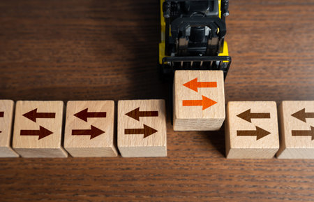 The forklift is interrupting the movement of traffic by removing one of its links. Control the operation and flow of processes. Disrupt work. management and control. Logistics and transportation.の写真素材