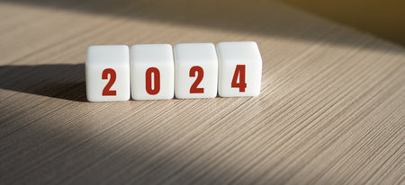 Wooden blocks with the inscription 2024. Setting goals and objectives for the new year. Planning, business management and strategy concept. Trends and ideas. vision.の写真素材