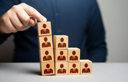 Reduce staff. How to avoid getting fired. Know the rights of a worker for who loosing work. Compensation. Planned layoffs. The collapse of the team.の写真素材