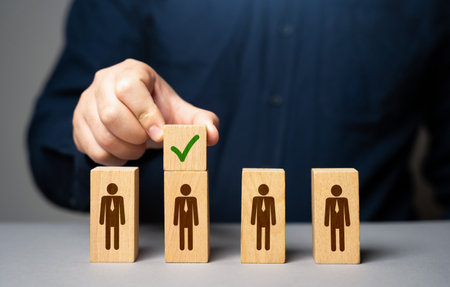 Make a hiring choice. Job candidate competition. Selection of the best candidate based on the results of the interview Selected winner. Hire and recruit. Candidacy approvalの写真素材