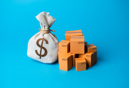 Goods boxes and dollar money bag. Efficient logistics and distribution systems. Trade balance. Global currency. Trade deal. Import and export.の写真素材