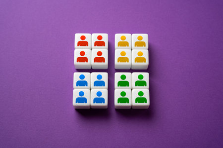 Divide people into groups. Break it down into teams. Market segmentation. Similar characteristics, needs, preferences, and behaviors. Narrow specialization of departments. Competition and cooperation.の写真素材