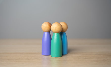 Three human figures. Team or group. Assistance, cooperation and collaboration. A meeting. Friendly...