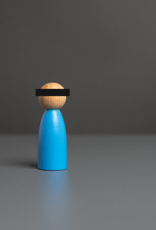 A man with a black stripe over his eyes. Anonymity concept. Witness protection program. Insider. Crimes and investigations. Suspect.の写真素材