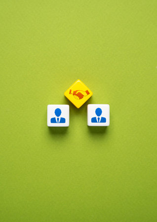 Reach an agreement. Sign the contract. Come to a consensus. Cooperation instead of competition....