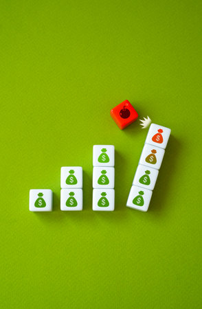 A blow to financial stability and savings. Losing money. Inflation. Devaluation of currencies. Economic crisis. Financial assets are at risk.の写真素材