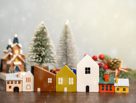 Many miniature houses and Christmas trees. Merry Christmas and Happy New Year! Festive preparing for the xmas holidays. Town, city, real estate concept.の写真素材