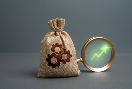 A bag of technical components and a green arrow pointing up. Concept of rising prices for parts, increasing volumes and quality of products. Market expansion, production scalingの写真素材