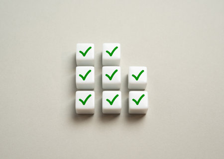 Check marks for completed work, achievements and completed stages. Completed objectives. Workflow optimization. Tracking system, project management. Performance recognitionの写真素材