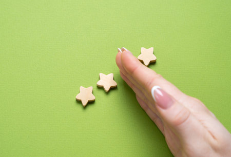 Loss of one star. From three stars to two. Dissatisfaction, declining quality, unmet expectations. Disappointment with product performance, service issues.の写真素材