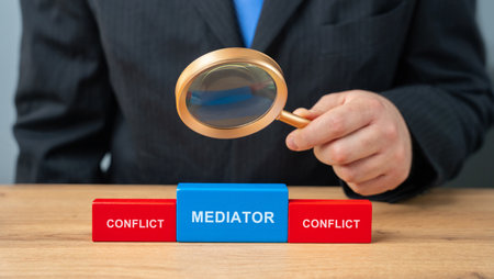 Wooden blocks with the word Mediator and conflict. Settlement of disputes by mediation. Dispute Resolution. Third party, intermediary.の写真素材