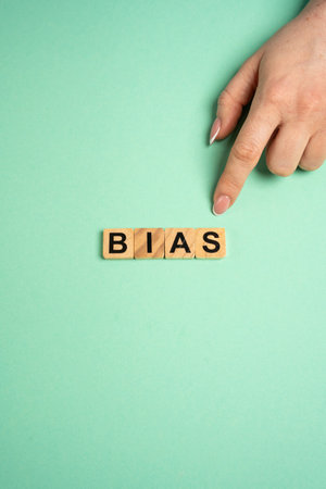 Wooden blocks with the word Bias. Prejudice. Personal opinions. Preconception