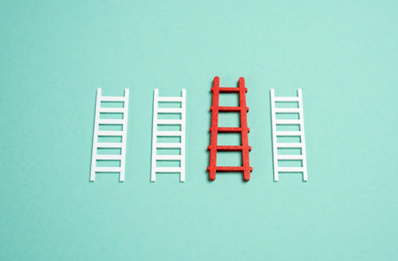 The red ladder stands out among others. The concept of the best of the options and plans. Most effective plan or optimal solution.の写真素材