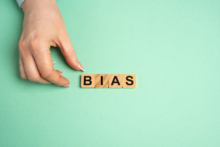 Wooden blocks with the word Bias. Prejudice. Personal opinions. Preconceptionの写真素材