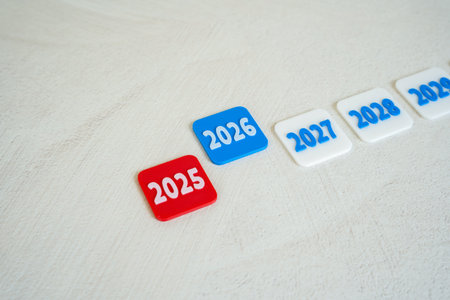 End of 2025 and beginning of 2026. New Year. Business forecasts. Seasonal shifts, performance reviews, or strategic pivots. Competitive business environments and professional sports planning.の写真素材