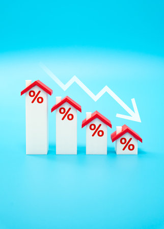Falling housing interest rates. Investment yields are declining. Construction rates and prices are falling in the real estate market. Lower property prices, decreased mortgage costs in housing market.の写真素材