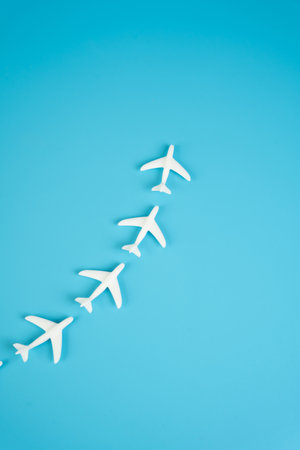 Airplanes fly in a chain one after another. Movement behind the leader. Permanent routes for flights. Charter flights. Established air corridors.の写真素材