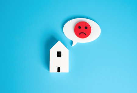 A house expressing negative emotions. Old housing, needs repair. Low demand for housing. No water, electricity or gas. Infrastructure problems. Real estate neglect.の写真素材