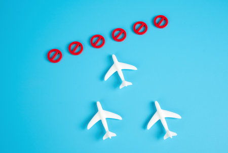 Planes collide with no-fly barrier. Closed airspace. Embargo. Security measures in escalating regional military conflict. Airline disruptions due to international conflict.の写真素材